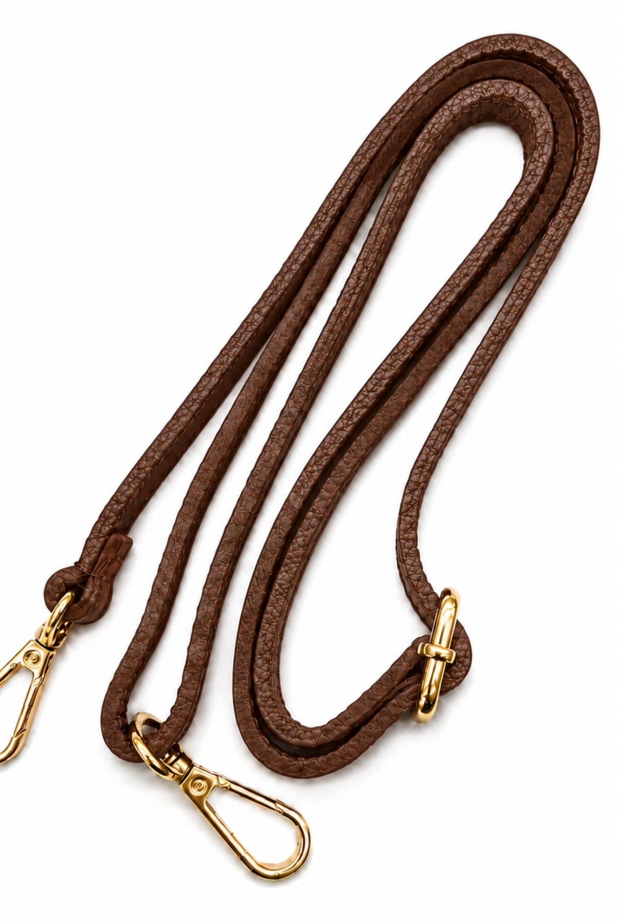 Detachable brown shoulder strap with gold-tone clasps.