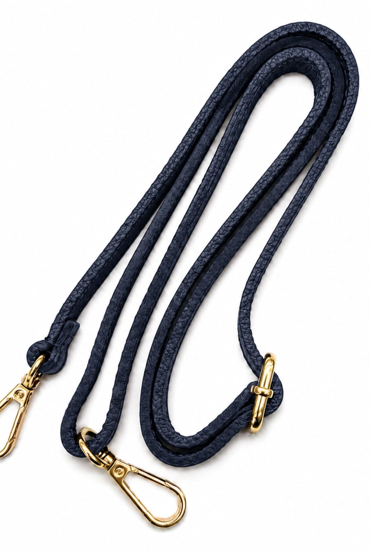 Detachable navy shoulder strap with gold-tone clasps.