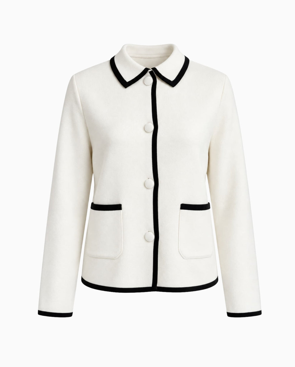 White collared cardigan with black contrast trim, covered buttons and front pockets.