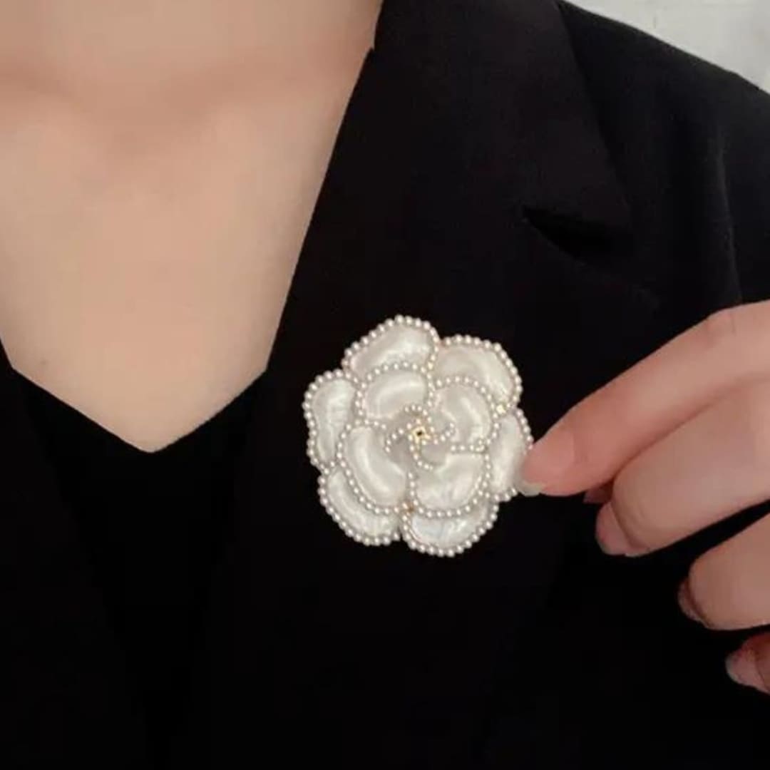 Statement brooches from Coventina Collection to enhance your look.