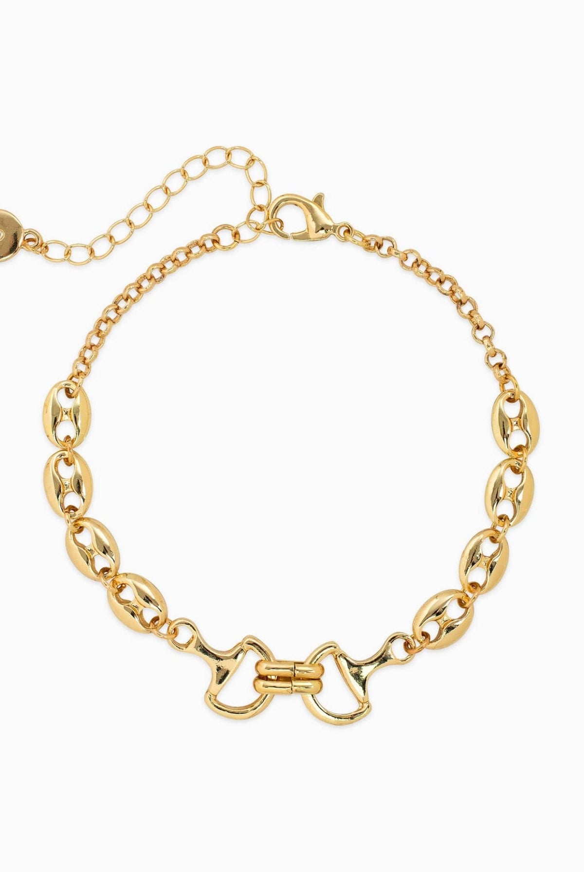 Gold horse bit chain bracelet with oval links and adjustable extender chain.