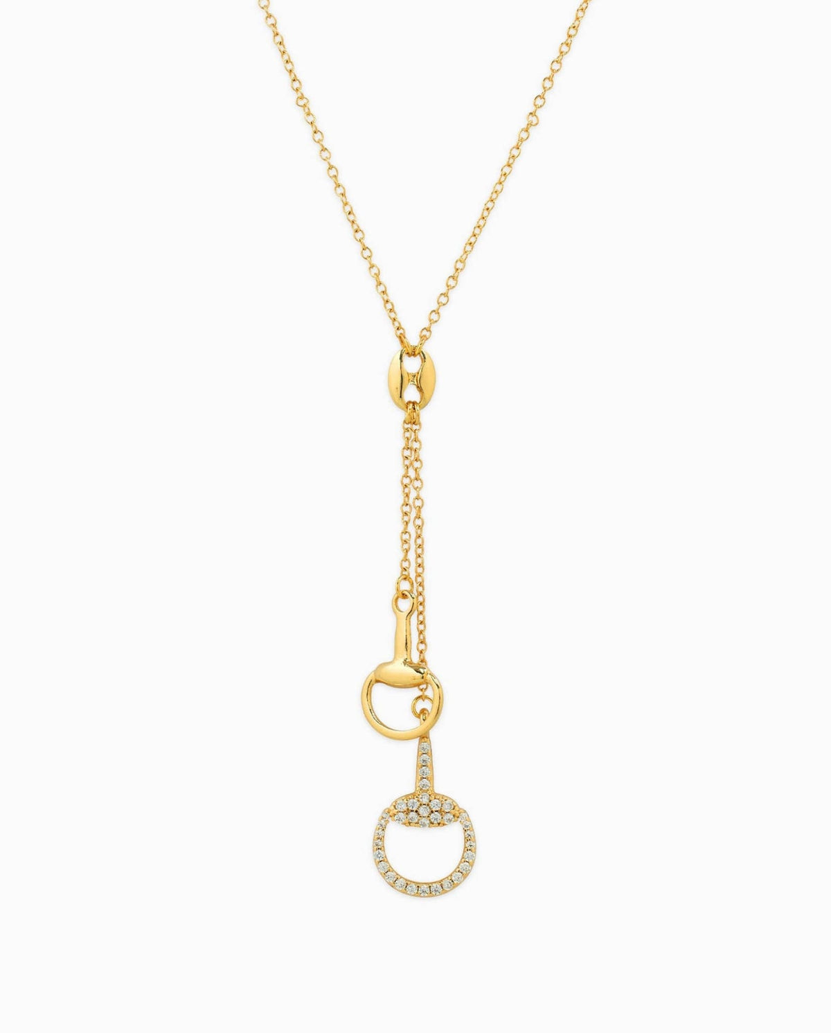 Gold drop necklace with horse bit pendants and crystal detailing.