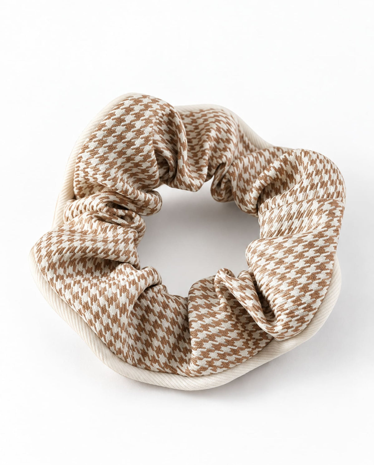 Houndstooth hair scrunchie in beige.