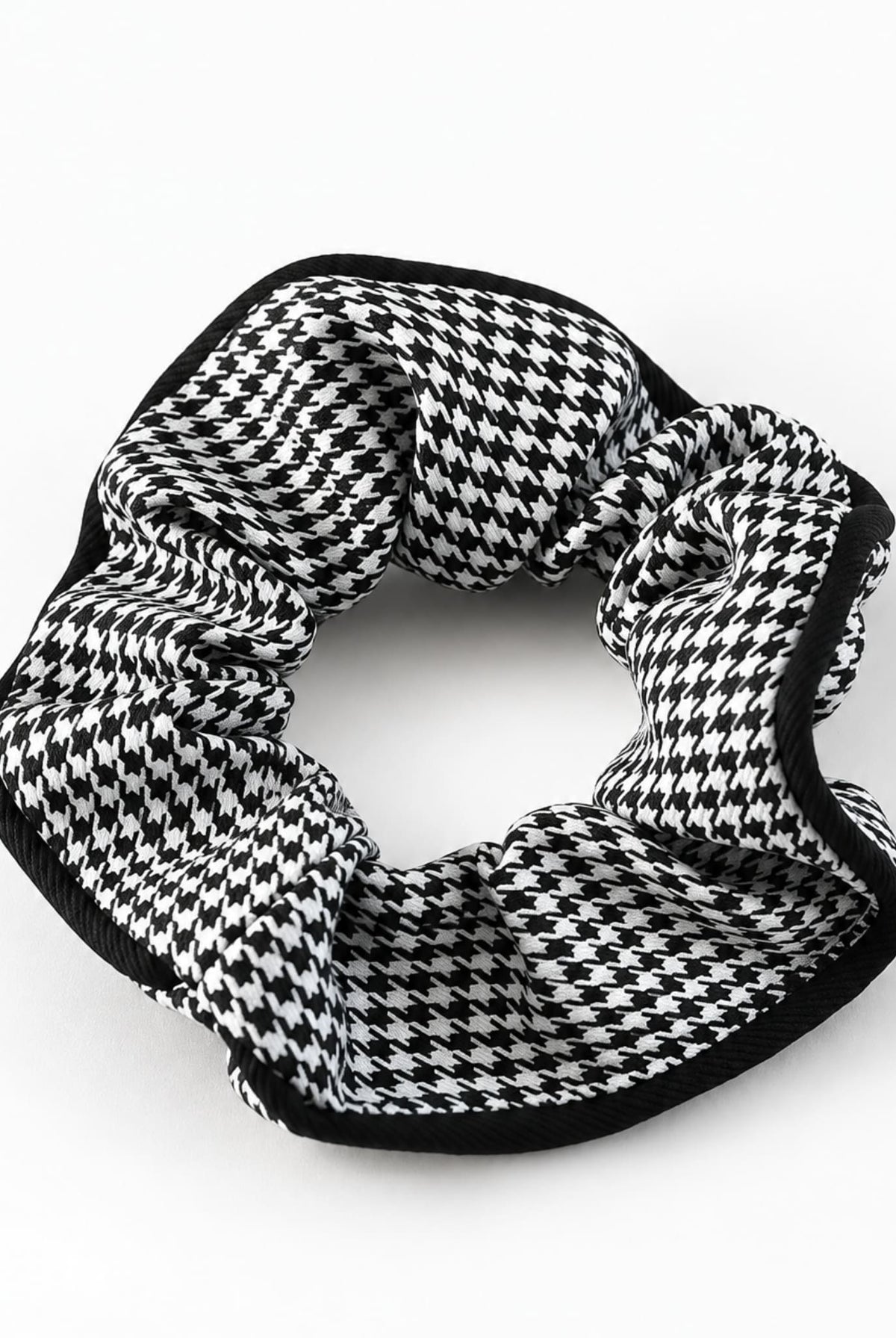 Houndstooth hair scrunchie in black.