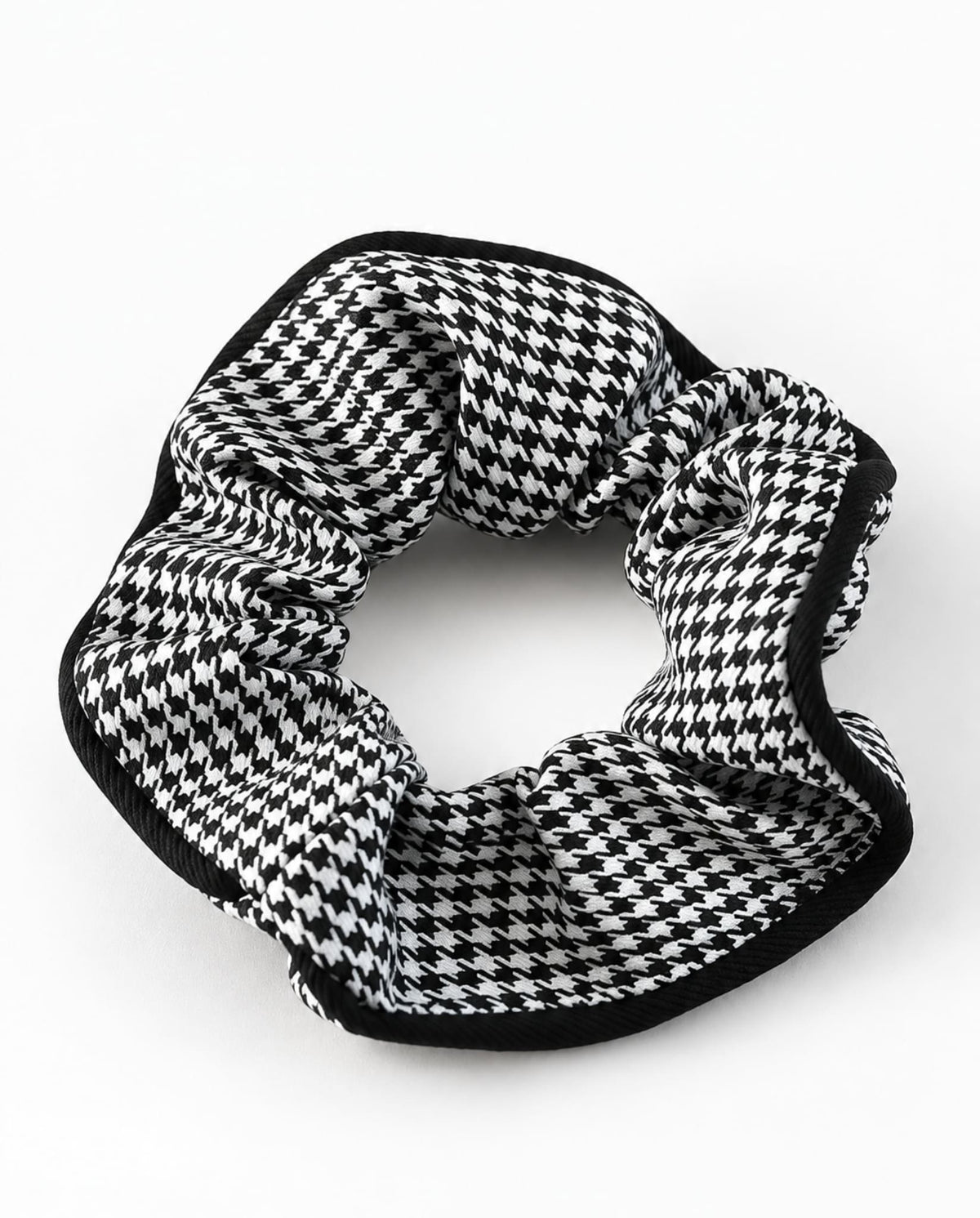 Houndstooth hair scrunchie in black.