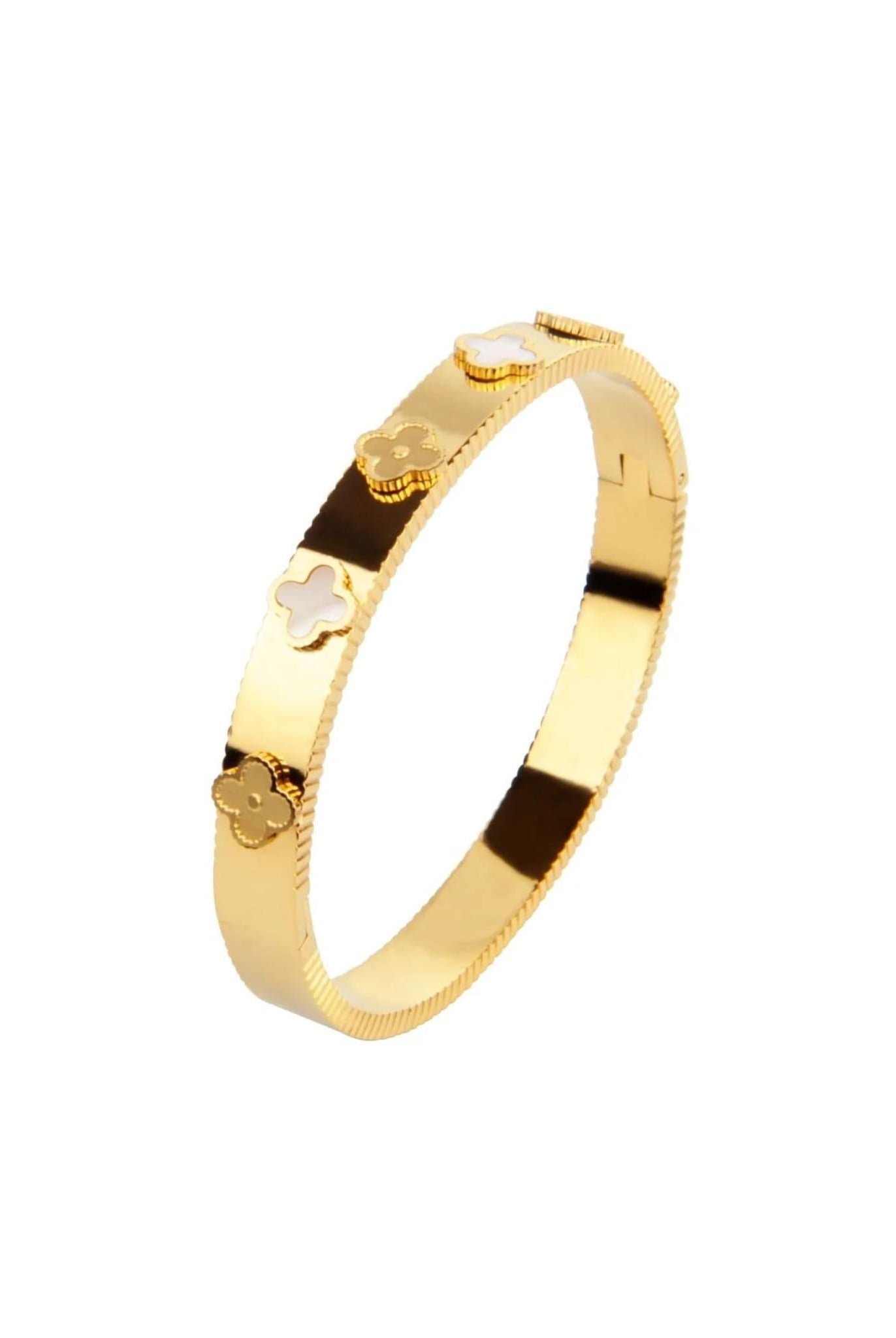 Women's gold bangle bracelet with clover details from Coventina Collection.