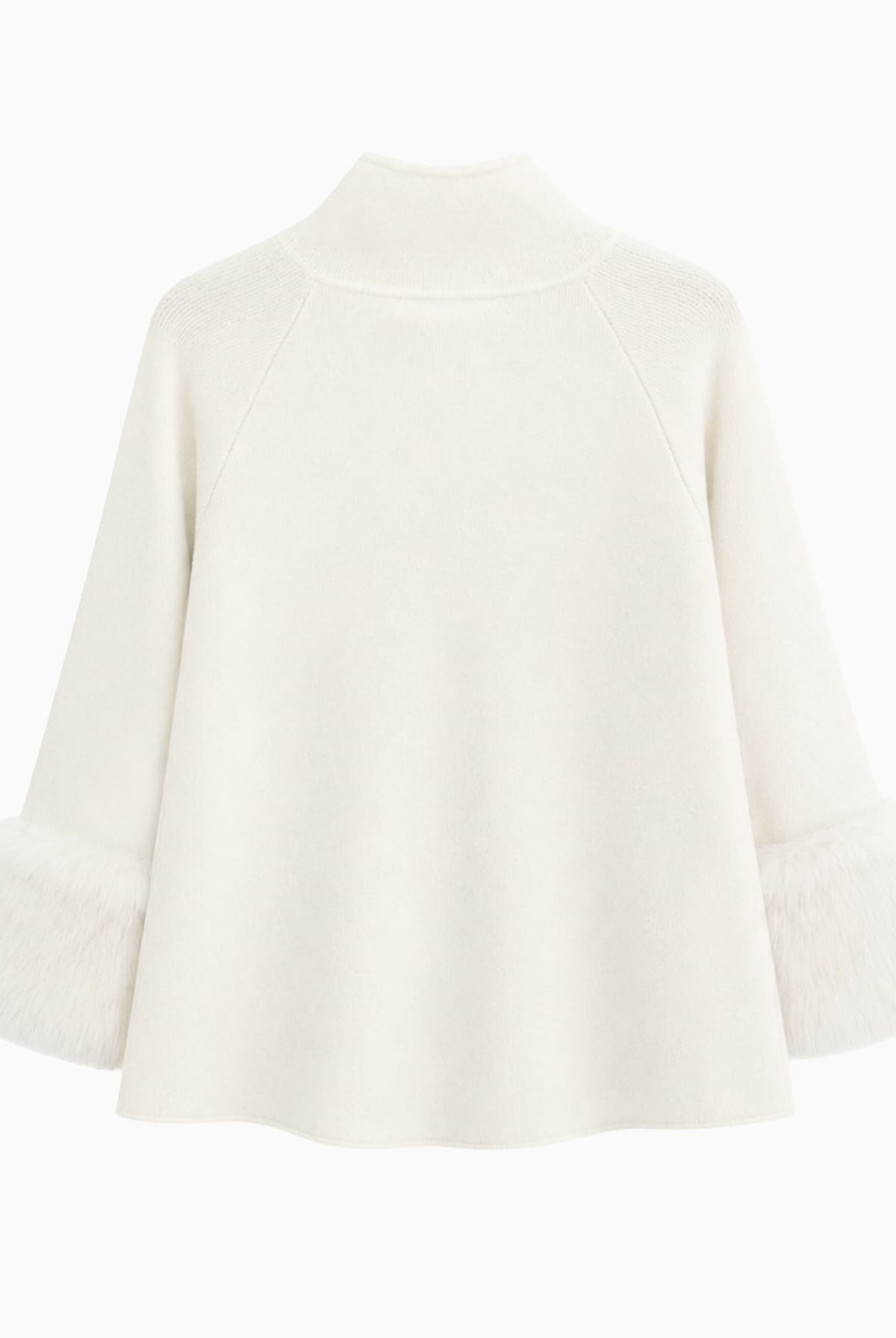 White knit poncho with faux fur cuffs, back view.