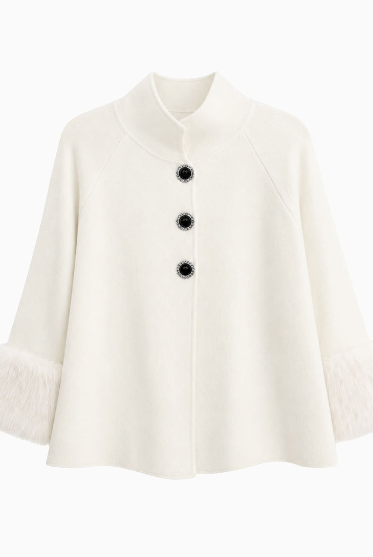 White knit poncho with faux fur cuffs and pearl rhinestone buttons.