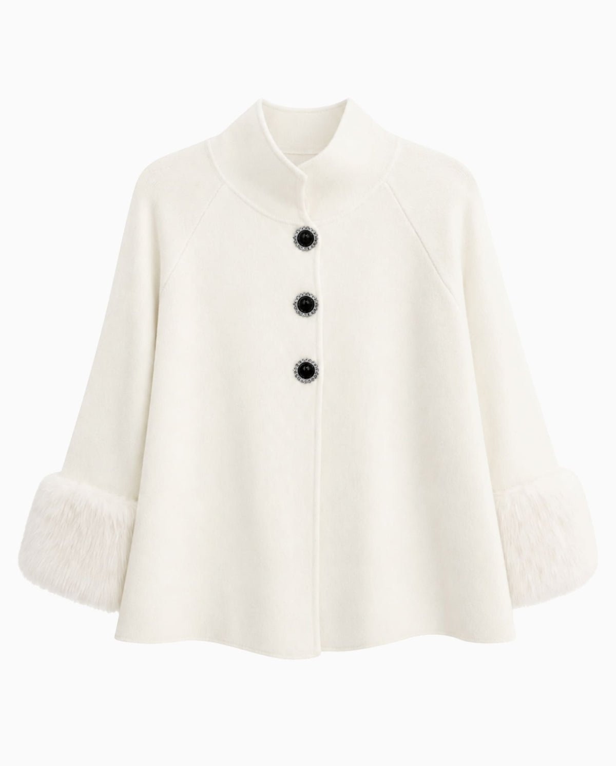 White knit poncho with faux fur cuffs and pearl rhinestone buttons.