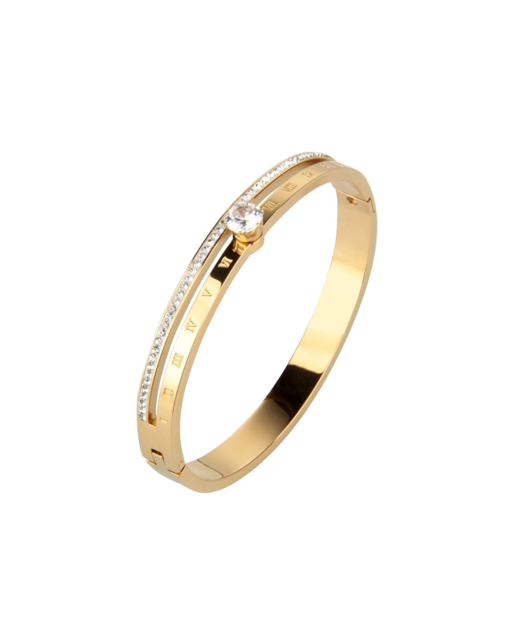 Gold Roman numeral bangle with a center rhinestone and sparkling accents.