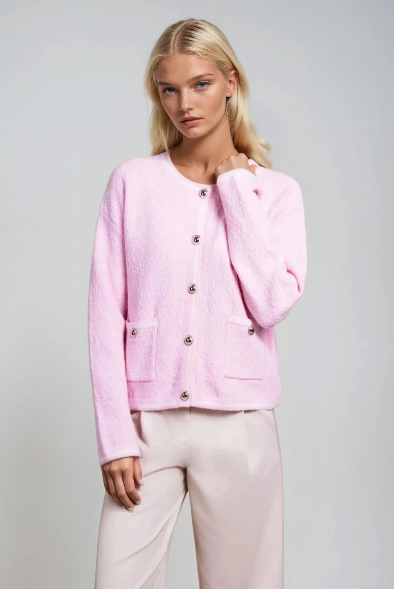 Powder pink textured cardigan for women, stylish knitwear from Coventina Collection.