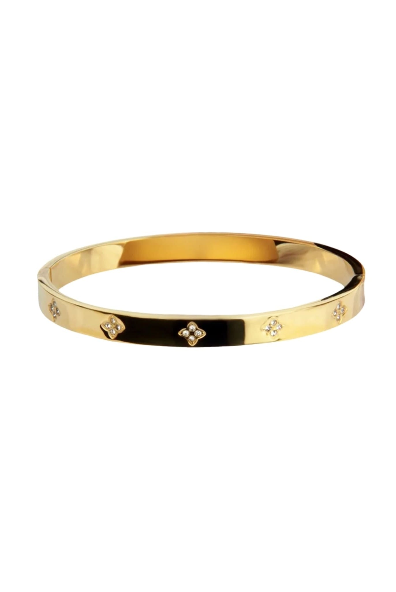 Gold stainless steel bangle bracelet with rhinestone clover accents.