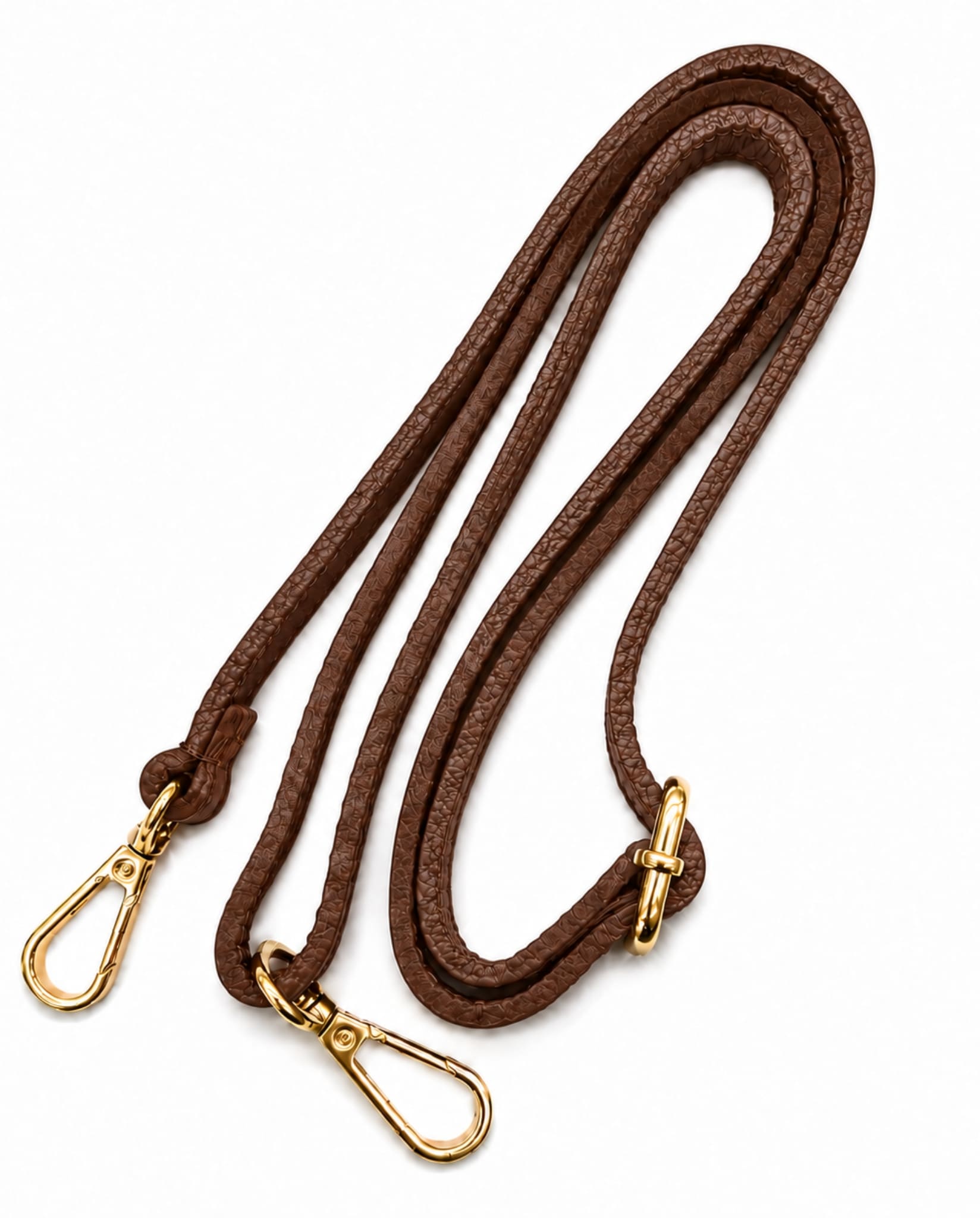 Detachable brown shoulder strap with gold-tone clasps.