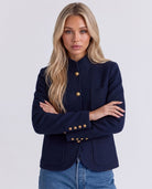 Heritage Knit Jacket in Navy styled with blue jeans.