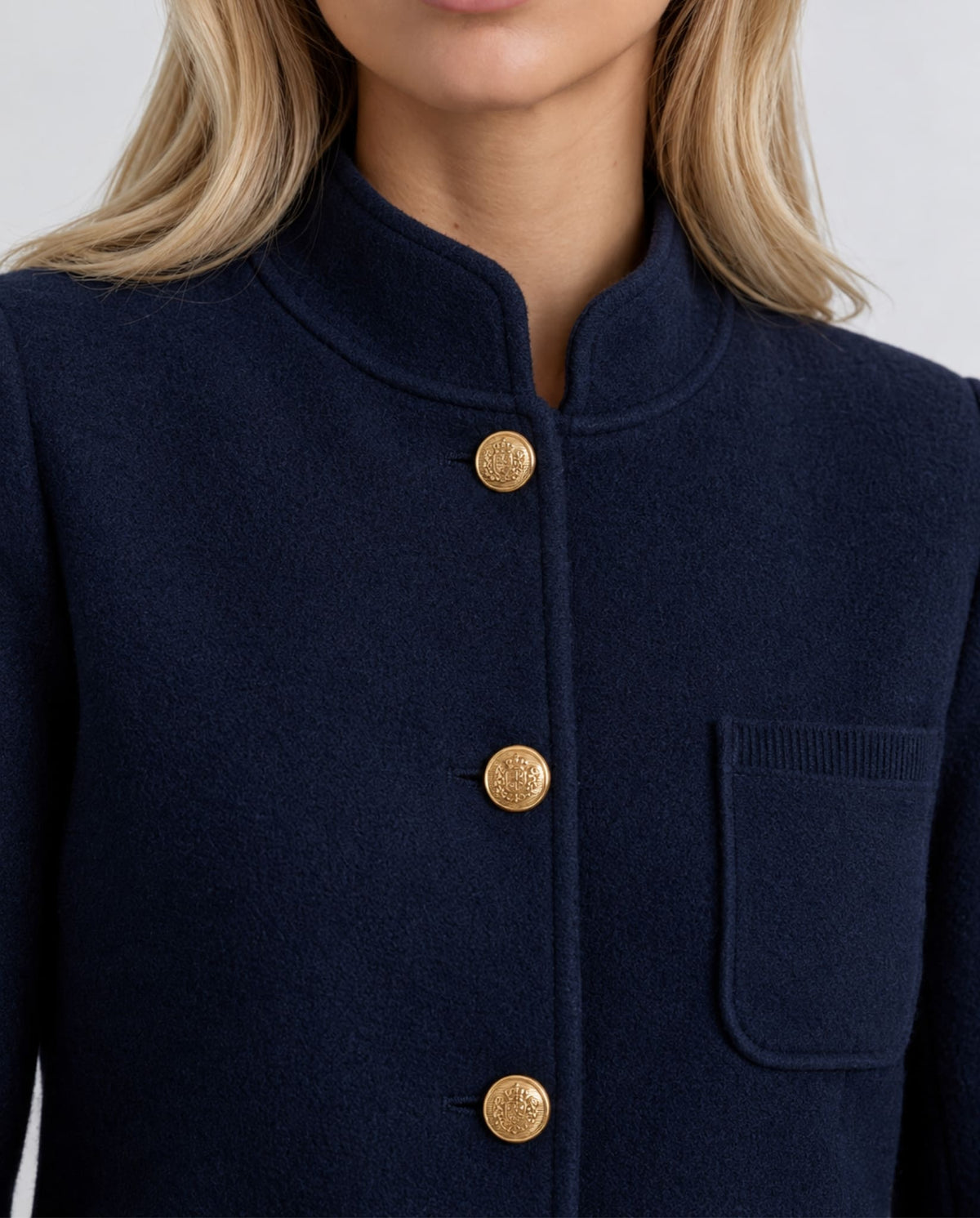 Close-up of Heritage Knit Jacket in Navy with gold-tone buttons.