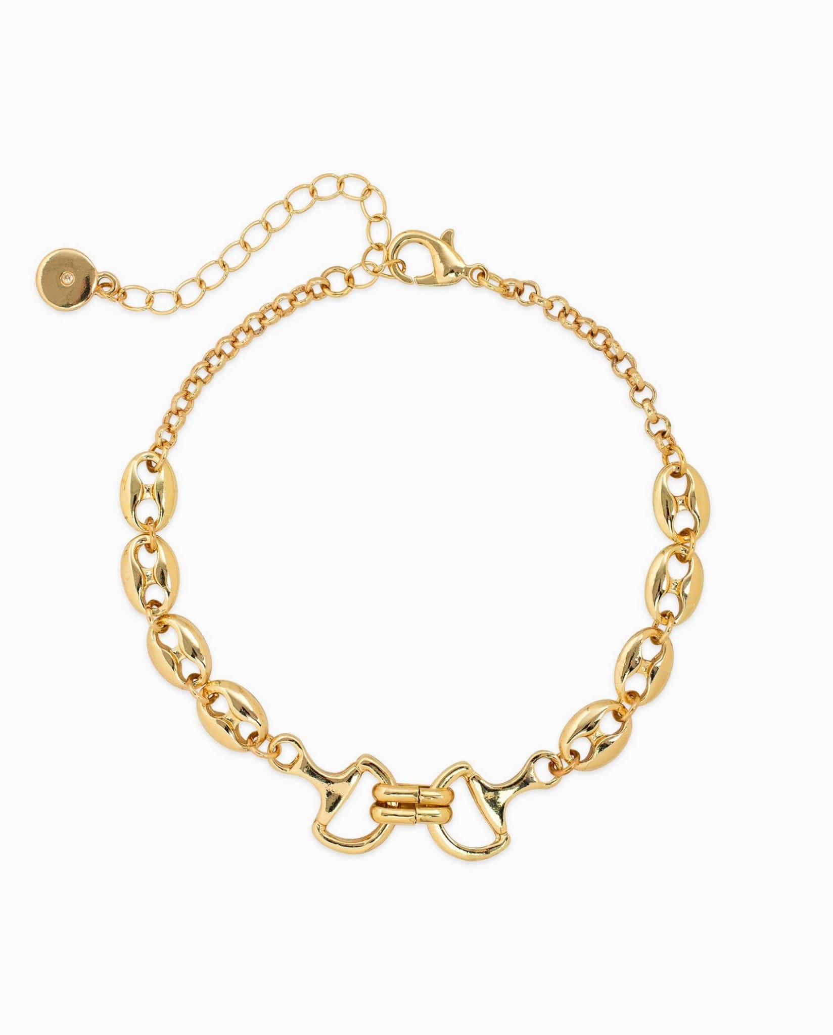 Gold horse bit chain bracelet with oval links and adjustable extender chain.