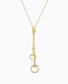 Gold drop necklace with horse bit pendants and crystal detailing.
