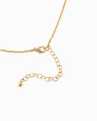 Gold horse bit necklace with adjustable chain and lobster clasp.