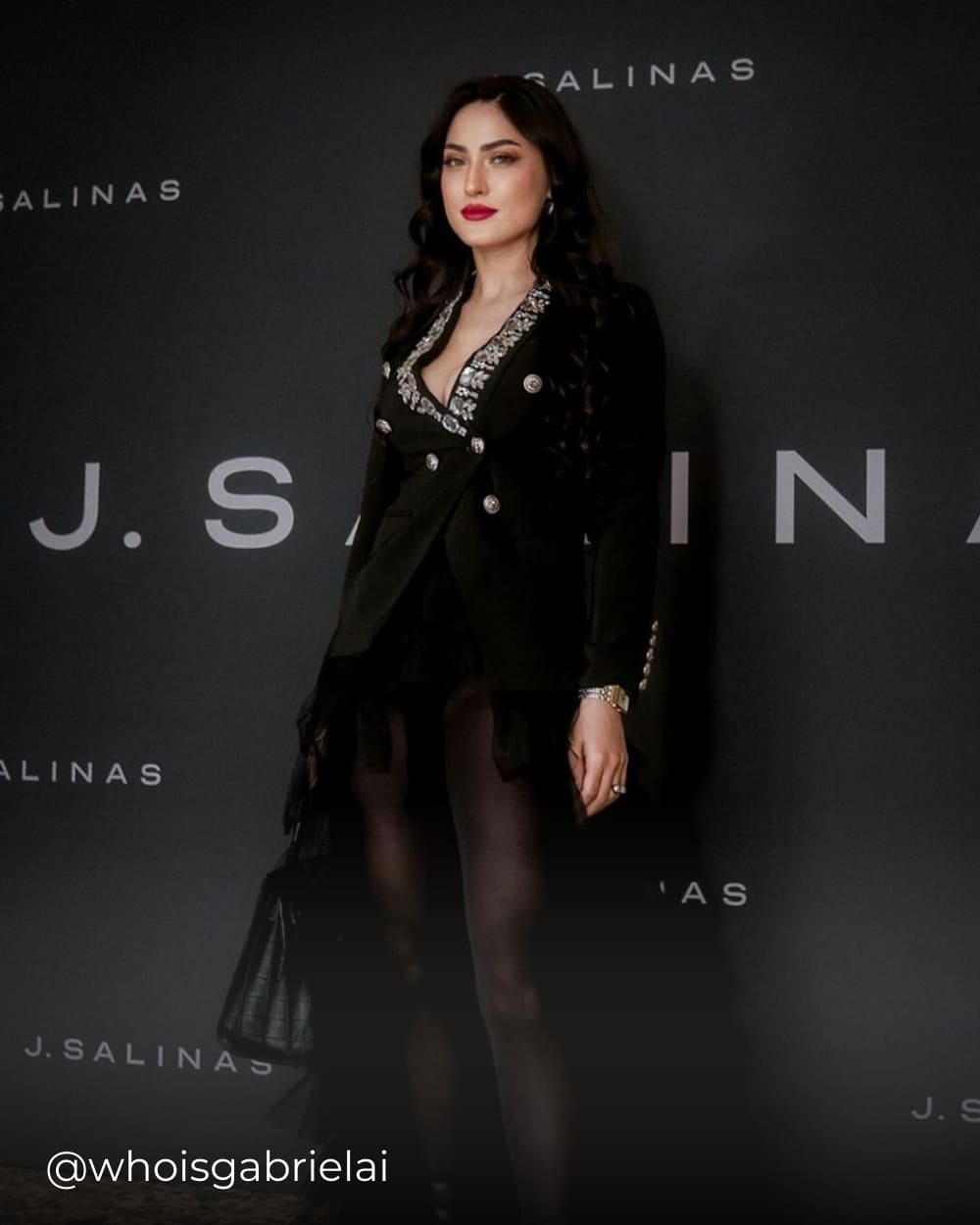 Gabriela wearing the black blazer with embellished collar from Coventina Collection