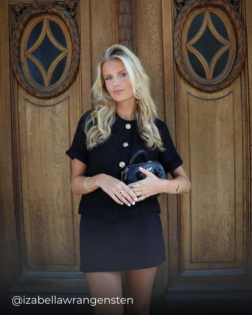 Izabella wearing the short sleeve tweed top from Coventina Collection