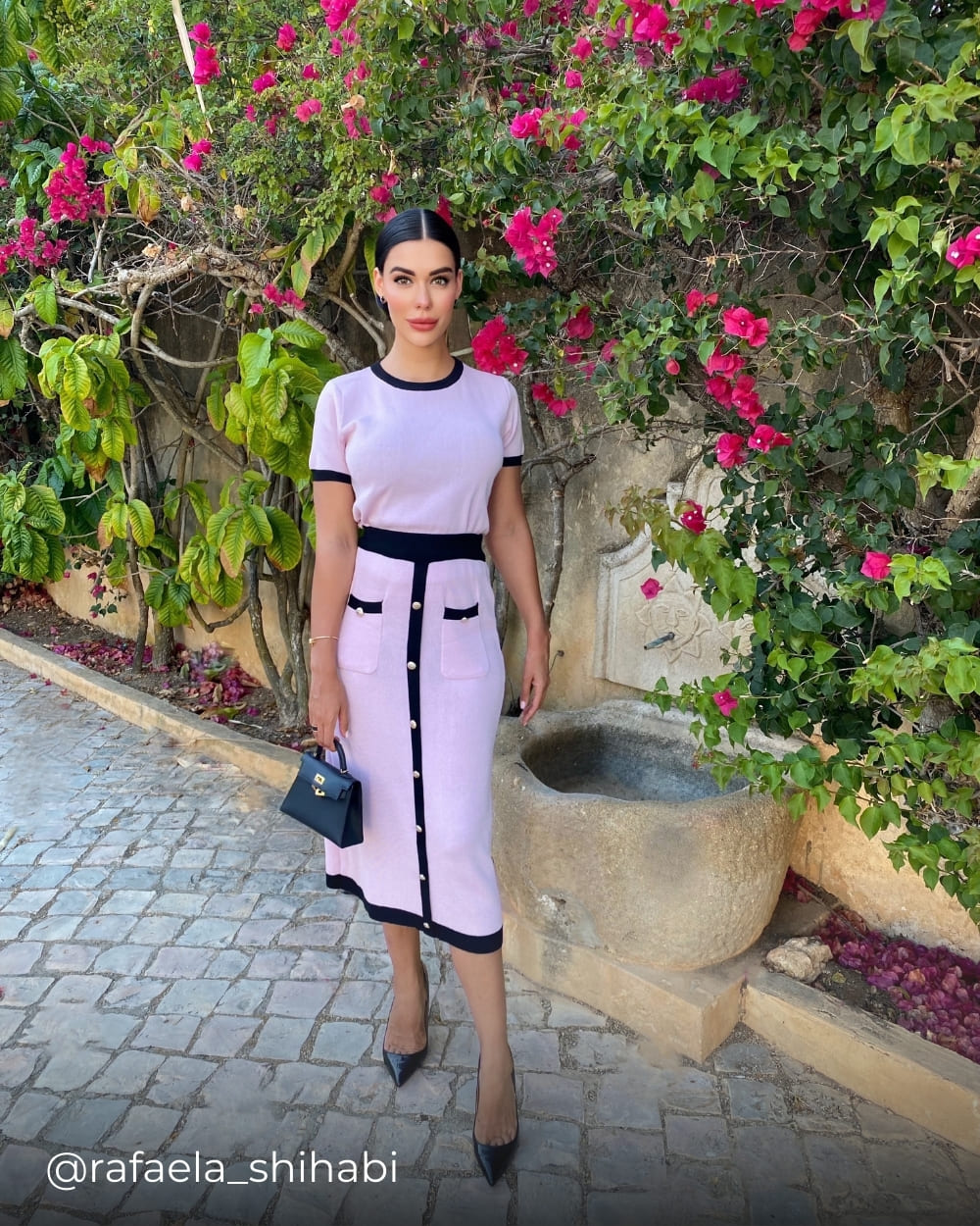 Rafaela wearing a skirt set from Coventina Collection